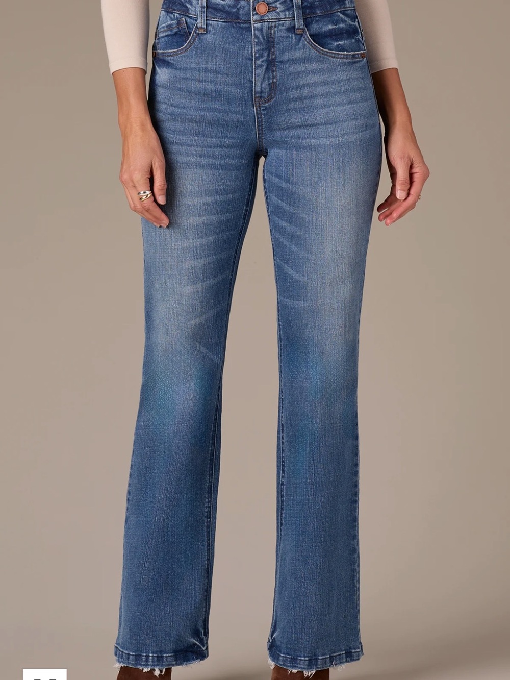 Madison High Rise Bootcut Jeans With Grinded Hem and Strings